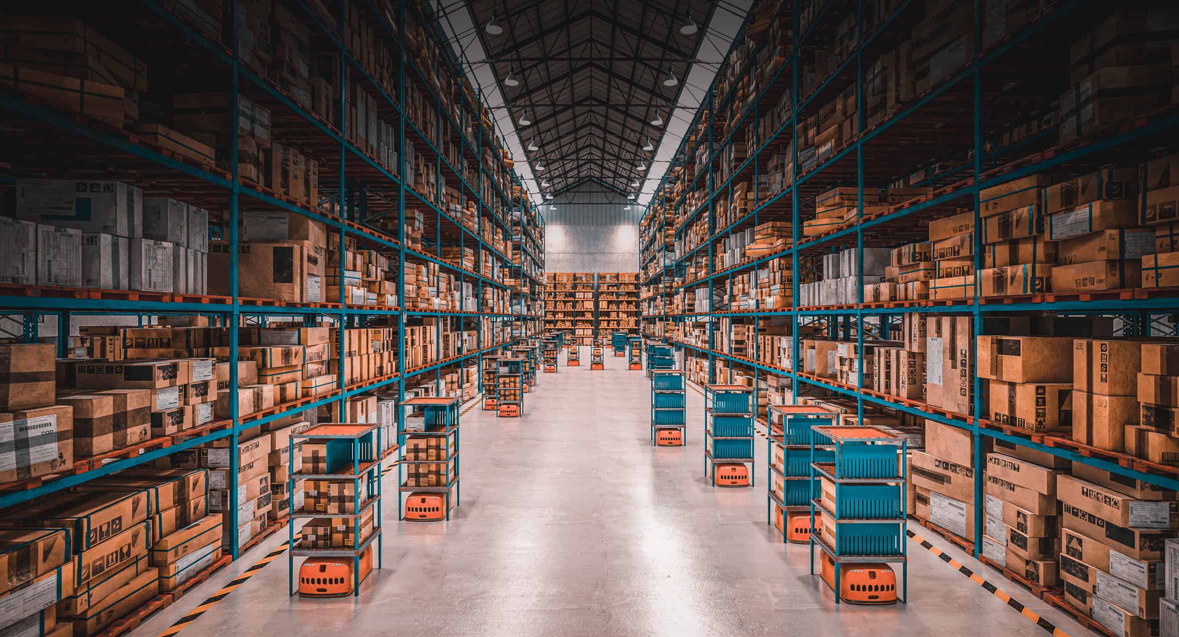 Interior Commercial Painting for Warehouses & Large Facilities Large commercial warehouse with teal steel shelving, stacked boxes, and polished concrete floor