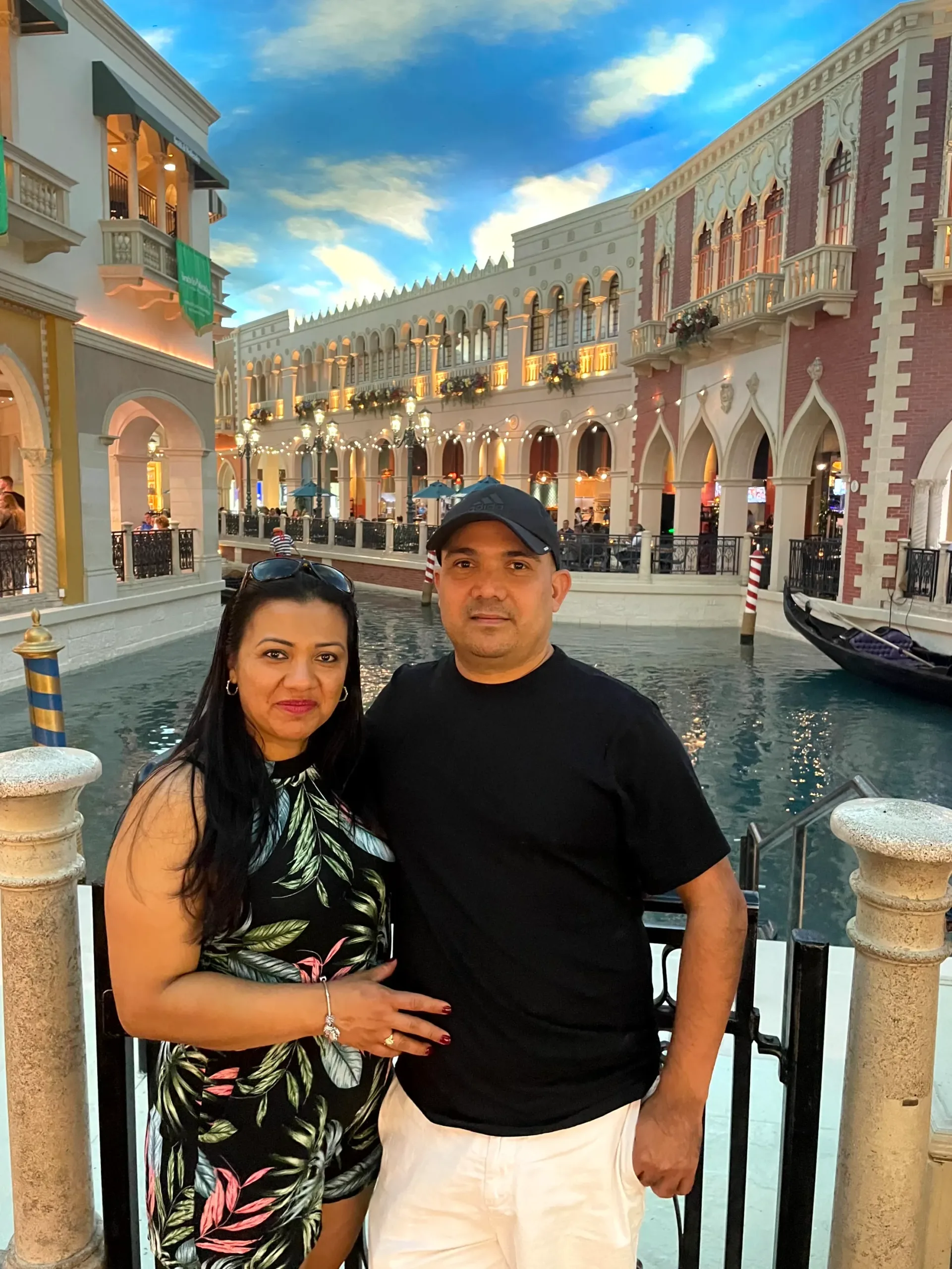 IMG_6540 The owner of the company, Juan Orellana and his wife posing in front of a beautiful Venetian themed canal and building backdrop.