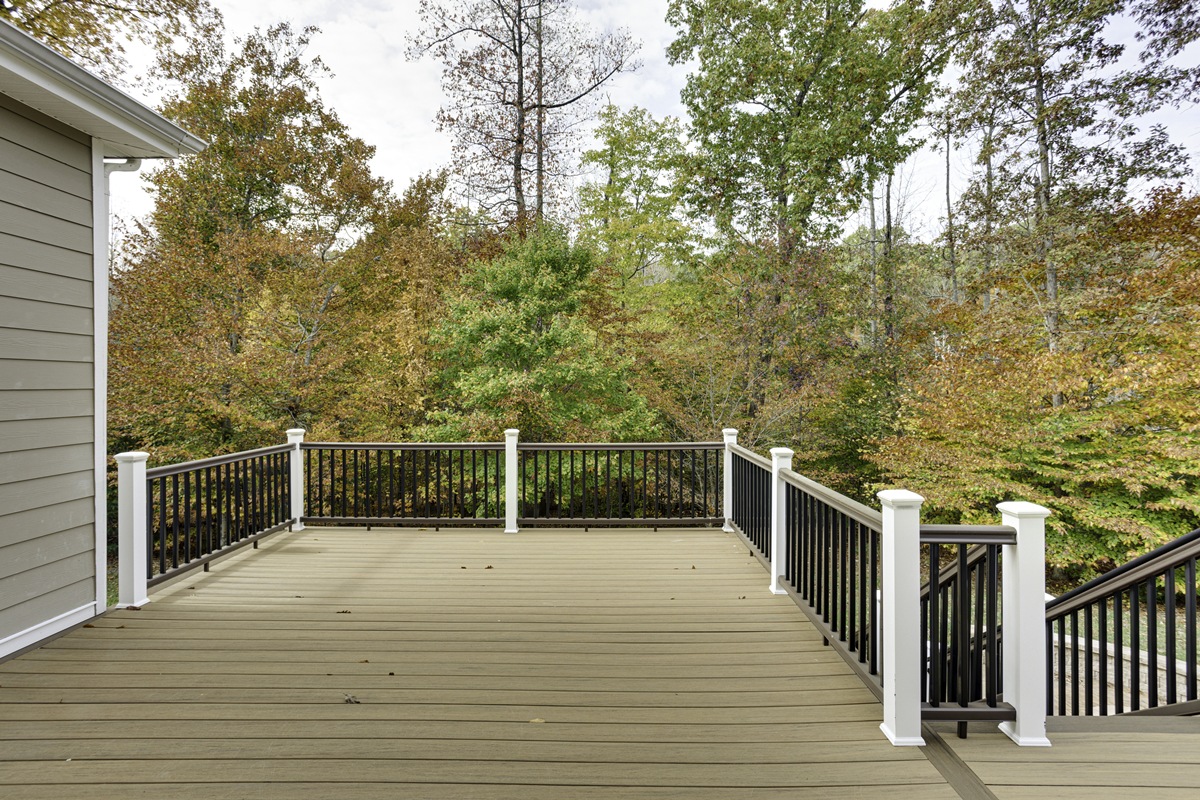 Spacious Wooden Deck Overlooking Autumn Forest View